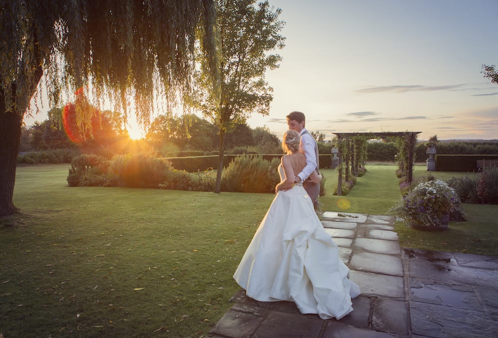 Newlyweds sunset wedding photos country house venue Surrey