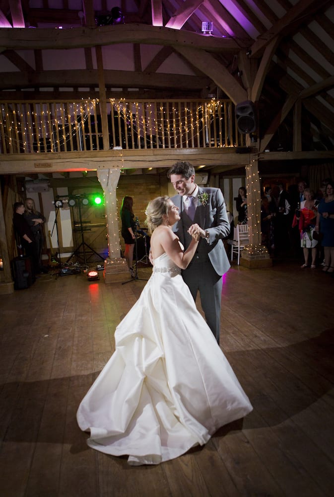 Newlyweds first dance rustic barn wedding