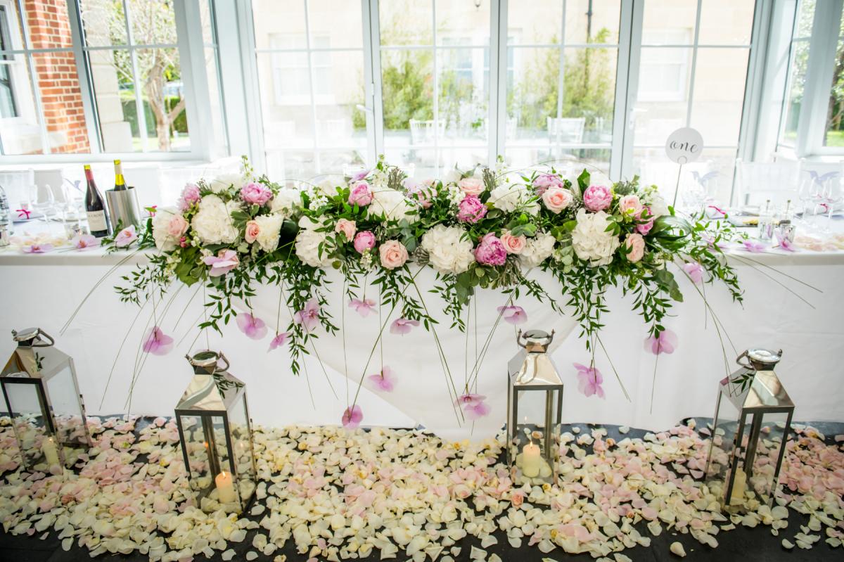 botleys mansion atrium top table decorated with flowers