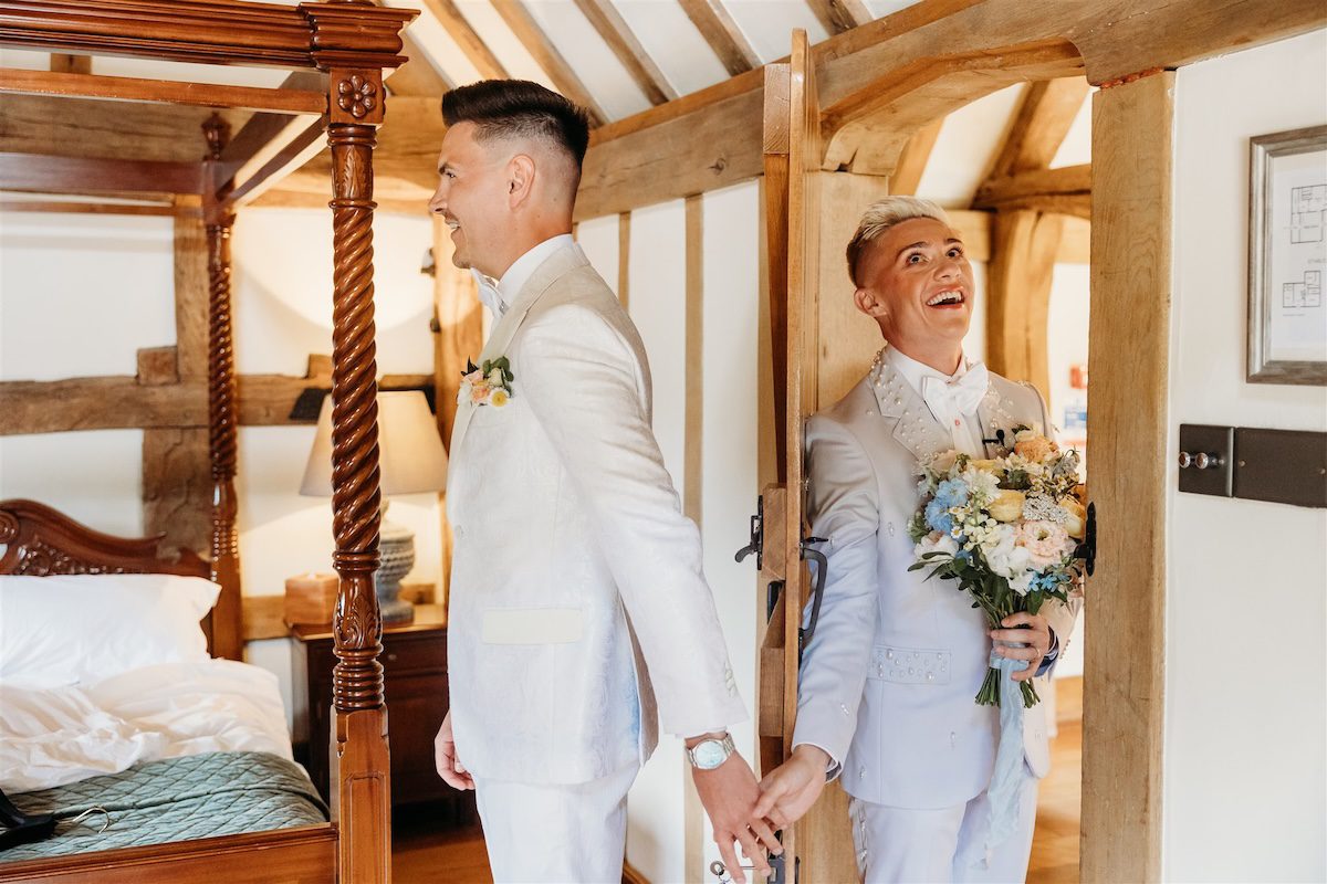Cain Manor groomsmen first touch moment
