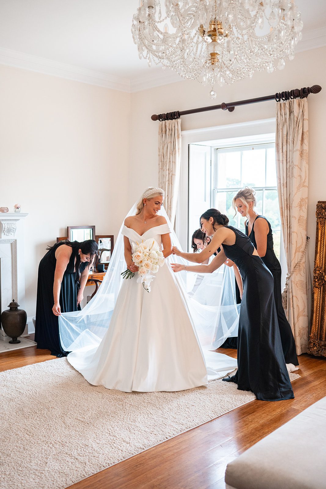 Bride and bridesmaids on wedding morning