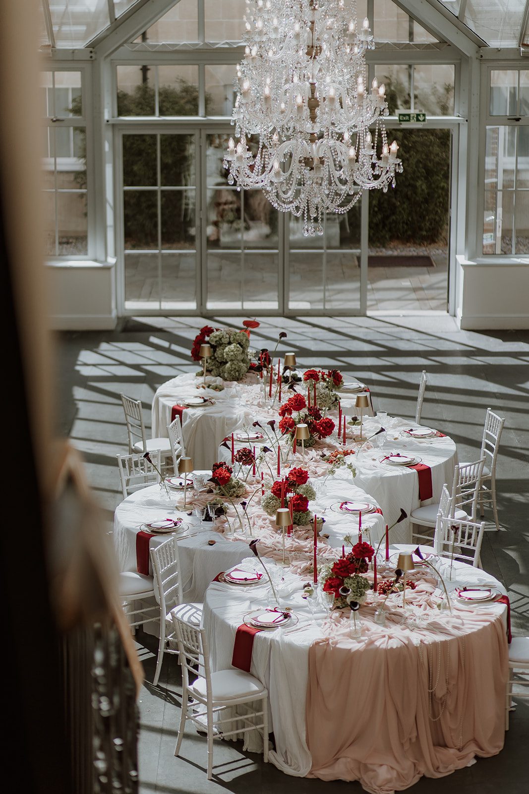 Serpentine tables at wedding venue near London
