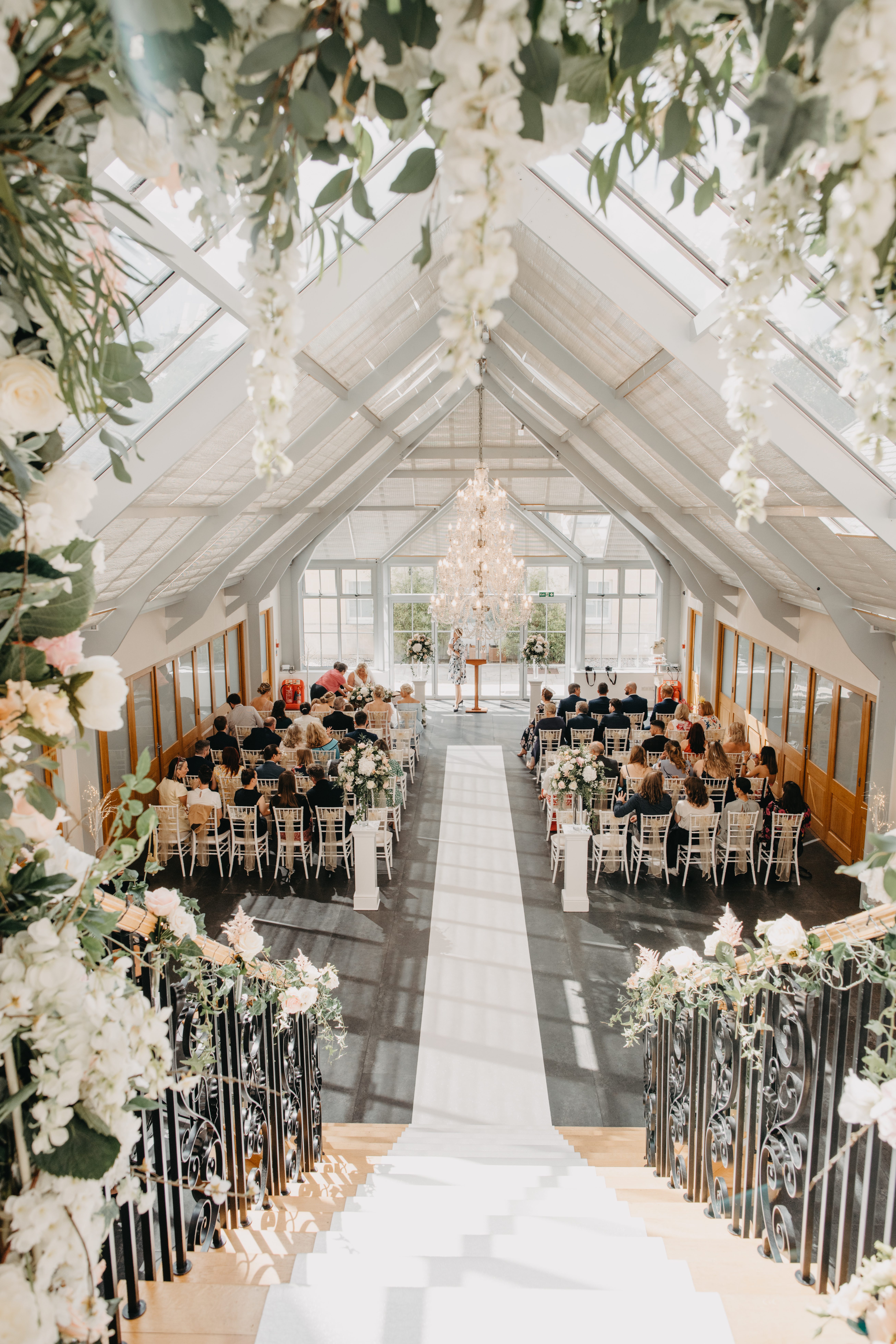 Atrium wedding ceremony at Botleys Mansion in Surrey