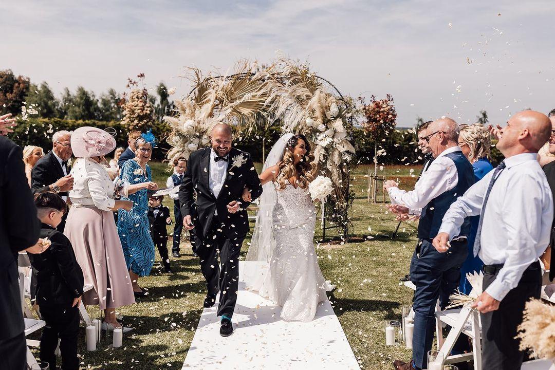 Couple getting married with confetti