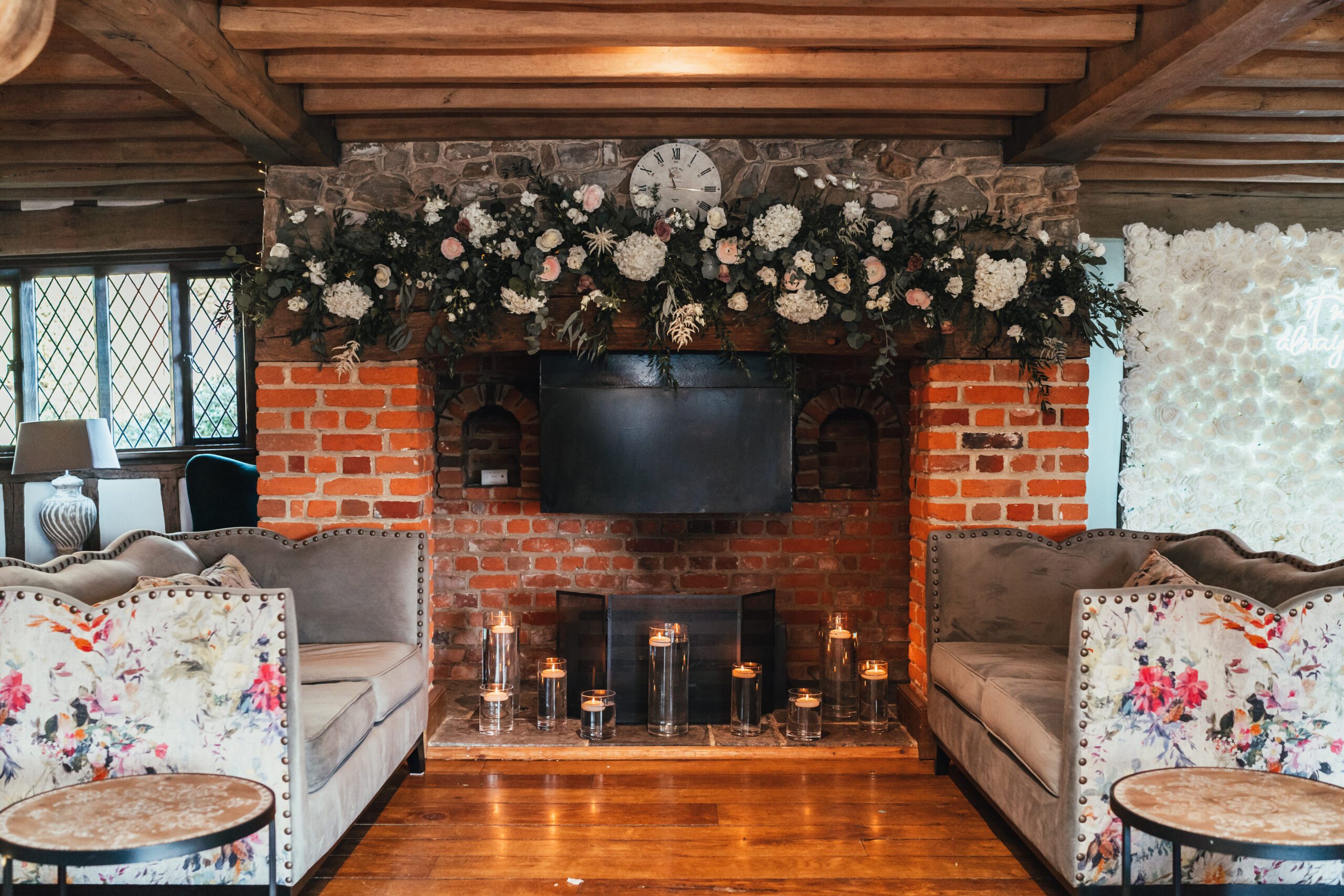 Floral fireplace display in Hampshire